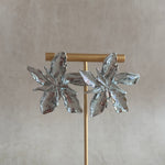 Make a statement with these Silver Leaf Earrings! With a bold and unique design, they are sure to add some flair to any outfit. Elevate your style and stand out from the crowd with these statement earrings.