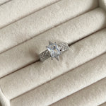 "Transform your look with our Crystal Cut Ring, adorned with sparkling cz crystals. This luxurious piece is both elegant and versatile, with an adjustable size to ensure the perfect fit. Elevate your style and make a statement with this exquisite ring." Adjustable one size.