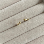 Gold Dainty Ball ring,  925 sterling silver Details: Adjustable one sizeTransform your look with our Gold Dainty Ball Ring. This elegant piece is crafted from sterling silver and coated with 14k gold, adding a touch of luxury to any outfit. With its delicate yet eye-catching design, this ring will be a timeless addition to your jewelry collection. 925 sterling silver Details: Adjustable one size