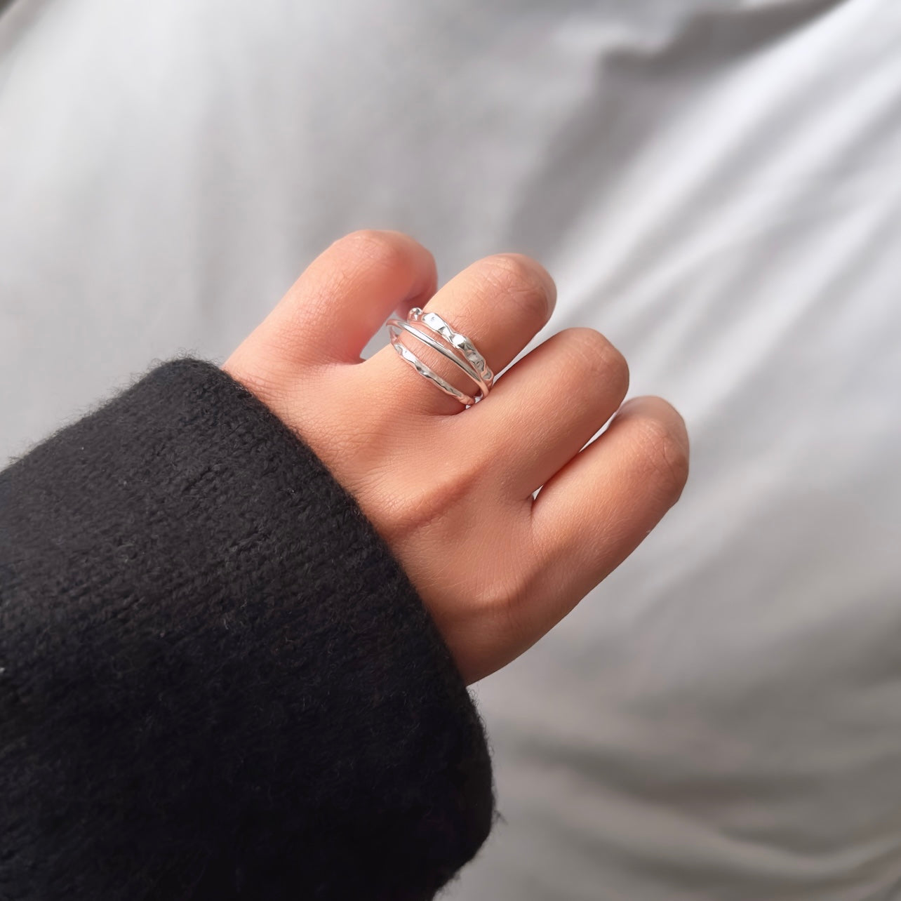 The Sasha Textured Ring is a sophisticated expression of modern minimalism. Crafted with three layers of 925 sterling silver, this adjustable ring is a timeless statement of elegance. Its subtle textured finish and adjustable size make this a perfect choice for the modern woman. Adjustable one size